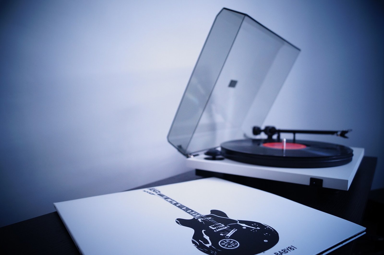 DJ workstation with turntable and vinyl record