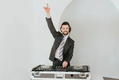 DJ Shane Elliott behind his decks, studio shot
