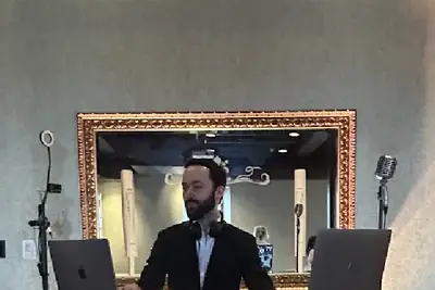 Evolved Entertainment in the company booth at a venue