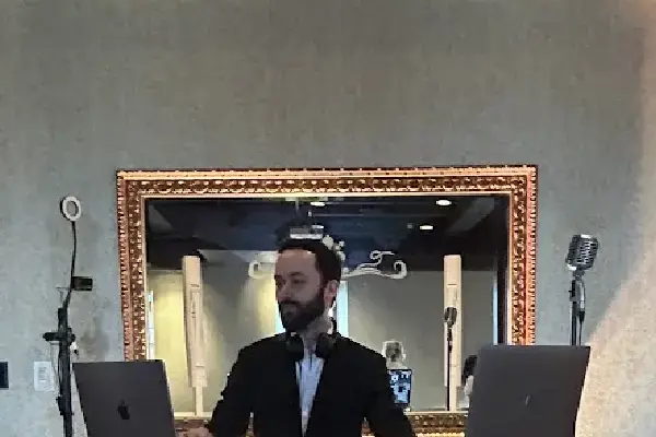 Evolved Entertainment in the company booth at a venue