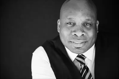 PSP Entertainment: black-and-white portrait of the owner
